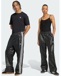 adidas - Pantaloni X Jeremy Scott Pride Faux Leather Wide - Lyst