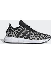 pink adidas swift run