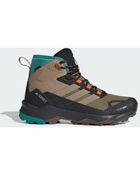 adidas - Terrex Skychaser Ax5 Mid Gore-Tex Climawarm+ Hiking Shoes - Lyst