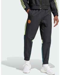 adidas - Manchester United Woven Tracksuit Bottoms - Lyst