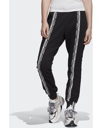 adidas pantaloni a zampa adidas pantaloni a zampa