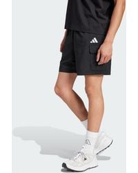 adidas - ESSENTIALS SMALL LOGO CARGO CHELSEA SHORTS - Lyst
