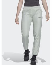 adidas - Pantaloni Multi Primegreen Windfleece - Lyst