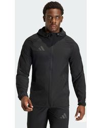 adidas - Tiro Travel Windbreaker Jacket - Lyst