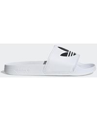 adidas Flip-flops and slides for Women - Up to 50% off at Lyst.com