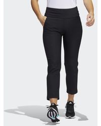 cropped adidas trousers