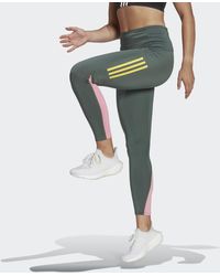 Femme Vêtements Pantalons décontractés Tight 7/8 Optime Trainicons Synthétique adidas en coloris Noir élégants et chinos Pantalons longs 