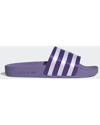 Chanclas de dedo y de pala adidas de mujer: hasta el 40 % de descuento |  Lyst