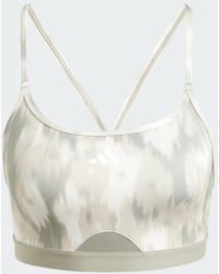 adidas - Sujetador Aeroreact Training Essentials Light-Support Allover Print Flower - Lyst