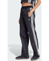 adidas - Firebird Track Pants With Knitted Crochet Details - Lyst
