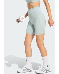 adidas - Optimé Essentials Stash Pocket 7-Inch Short Leggings - Lyst