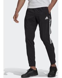 Bespaar 35% pantalons en chinos voor Casual broeken Heren Kleding voor voor Broeken adidas Sportbroek Dq3099 in het Zwart voor heren 