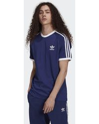 adidas Baumwolle Adicolor Classics 3-Streifen T-Shirt in Blau Damen Bekleidung Hosen und Chinos Leggings 