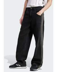 adidas - Pantaloni Adicolor Denim Firebird - Lyst