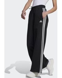 adidas - Pantaloni Essentials 3-Stripes French Terry Wide - Lyst