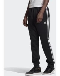 adidas originals 24k superstar track pants