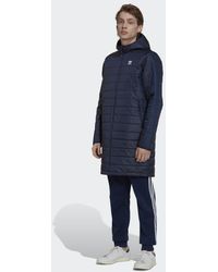 Herren Bekleidung Mäntel Lange Mäntel und Wintermäntel adidas Synthetik Gefütterter Mantel in Blau für Herren 