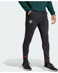 adidas - Pantaloni Designed for Gameday Manchester United FC - Lyst