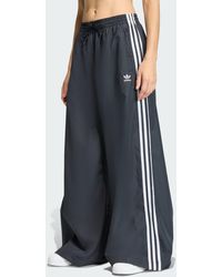 adidas - Pantaloni Track Firebird Adilenium - Lyst