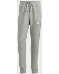 adidas - Essentials French Terry Tapered Cuff 3-stripes Joggers - Lyst