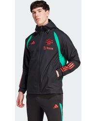 adidas - Giacca Tiro 23 All-Weather Manchester United FC - Lyst