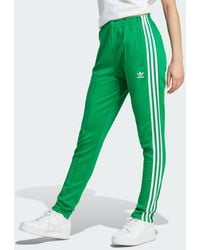 adidas Primeblue Sst Trainingsbroek in het Groen | Lyst NL