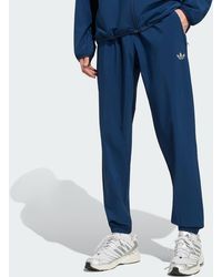 adidas - Tech Trefoil Essentials Track Pant - Lyst
