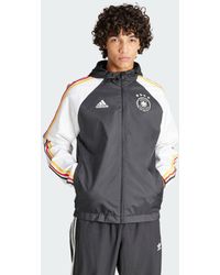 adidas - Giacca a vento DNA Germany - Lyst