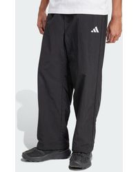 adidas - Pantaloni Essenziale Con Piccolo Logo E Orlo Aperto - Lyst
