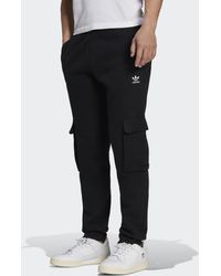 Pantalones de vestir de adidas para hombre | FASHIOLA.es