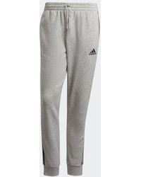 adidas - Essentials Tapered Cuff 3-Stripes Joggers - Lyst
