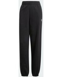adidas - Essentials Fleece Loose Joggers - Lyst