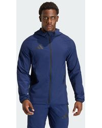 adidas - Tiro Travel Windbreaker Jacket - Lyst