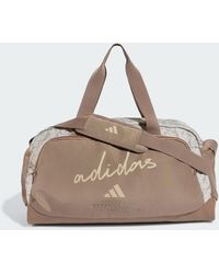 adidas - Defender Allover Graphic Duffle Bag S - Lyst