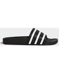 adidas - Adilette Three-stripe Slides - Lyst
