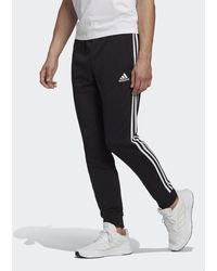 essentials french terry tapered cuff 3 stripes joggers