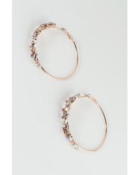 balenciaga bottle cap earring
