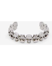 McQueen - Bracciale Rigido Multi Skull - Lyst