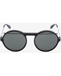 Alexander McQueen Runde Sonnenbrille aus Acetat mit Piercing-Detail - Schwarz
