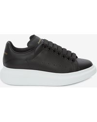 McQueen - Sneakers basse oversized in pelle nera - Lyst