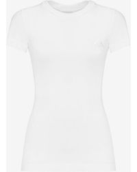 Alexander McQueen - Körperbetontes t-shirt mit siegellogo - Lyst