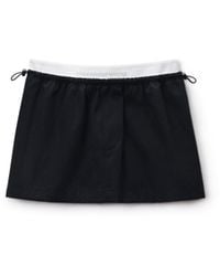 Alexander Wang - Mid-Rise Mini Logo Elastic Skirt - Lyst