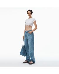Alexander Wang - Logo-Embossed Balloon Jeans - Lyst
