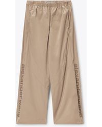 Alexander Wang - Perforated Logo Mid-Rise Track Pants - Lyst