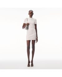Alexander Wang - Debossed Logo Mock Neck Dress - Lyst