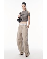 Alexander Wang - Mid Rise Pleated Wide-Leg Pant With Logo Elastic Waist - Lyst