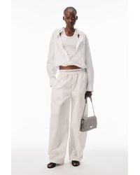 Alexander Wang - Mid Rise Pleated Wide-Leg Pant With Logo Elastic Waist - Lyst