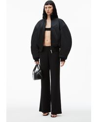 Alexander Wang - Silk Charmeuse Flared Low Rise Pant With Nameplate - Lyst