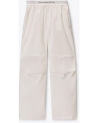 Alexander Wang - Mid-Rise Pleated Wide-Leg Pant With Logo Elastic Waist - Lyst