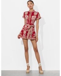 Alice + Olivia - Lucy Button Down Romper - Lyst
